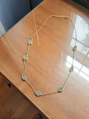 Gold Teardrop Necklace with Green Gem Accents